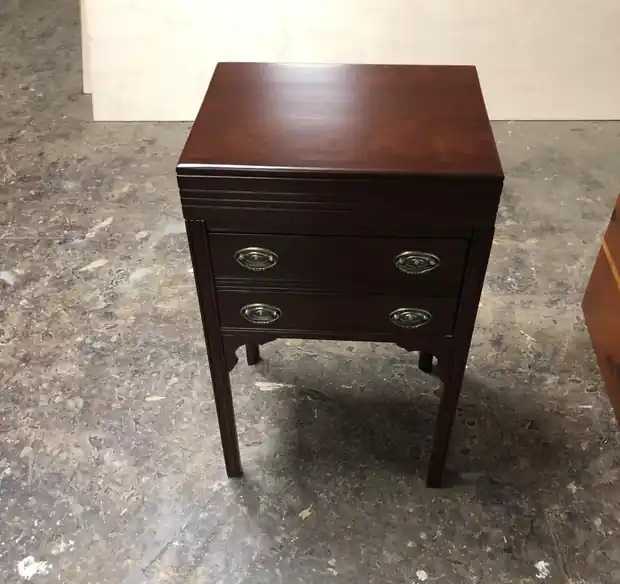 Writing cabinet after refinishing in deep mahogany with brass pulls