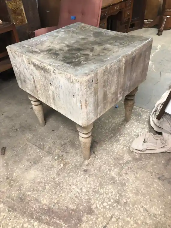 Butcher block cart before restoration, stained and grey