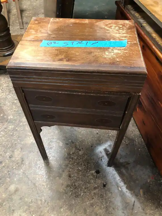 Small writing cabinet before work, scuffed and dull