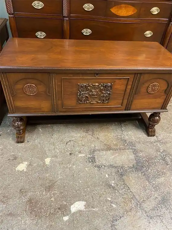Carved cedar chest with a finished front panel
