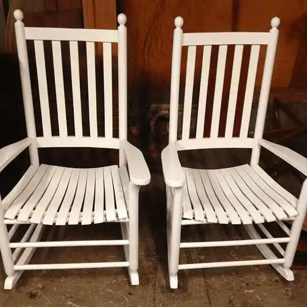 Pair of white painted slat-back rocking chairs
